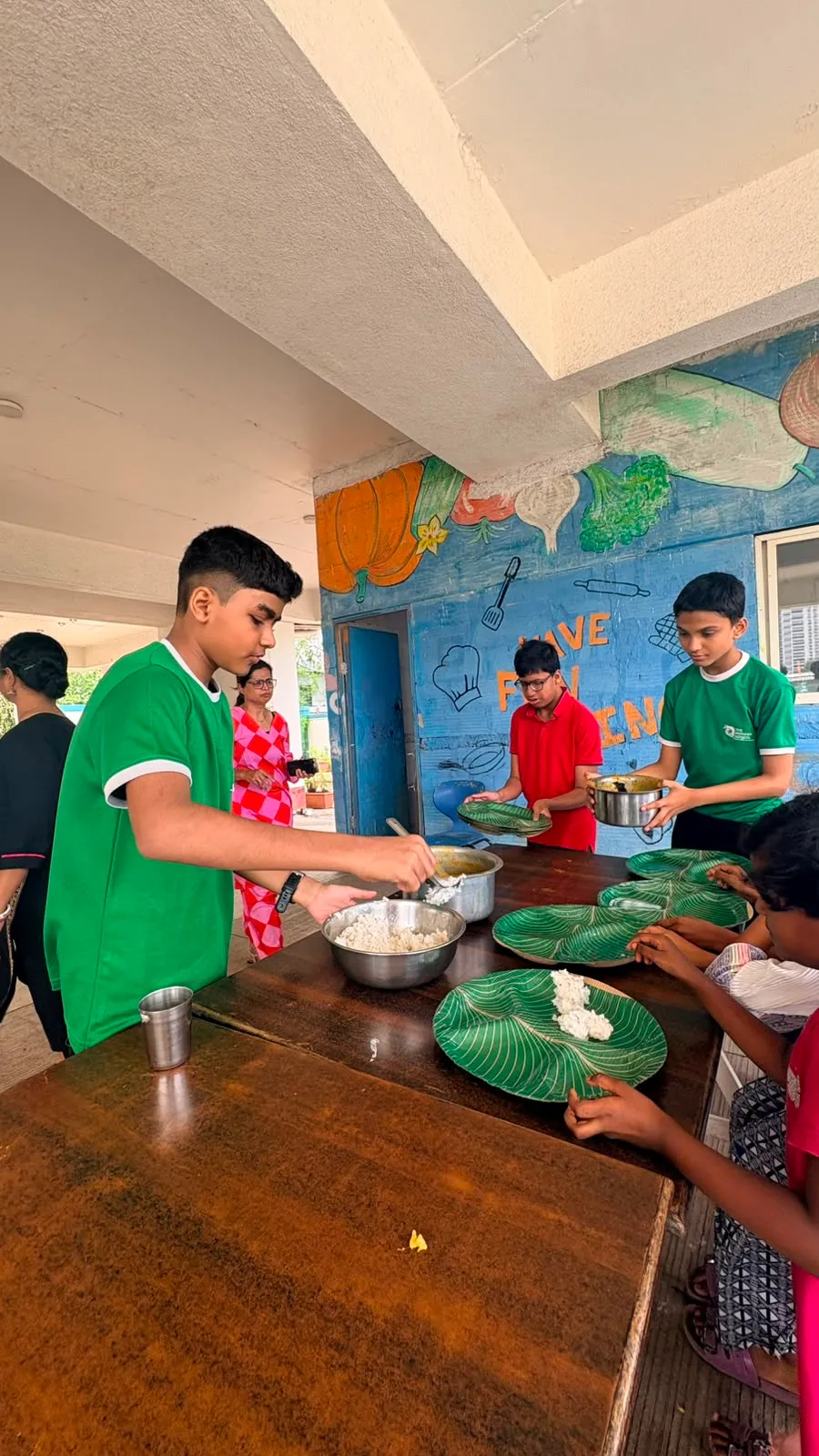 Volunteers serving meals